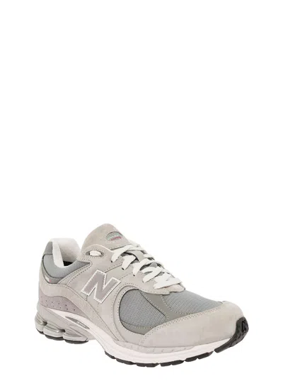 Shop New Balance Sneakers In Grey/neutrals