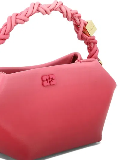 Shop Ganni "mini Bou" Handbag In 粉色的
