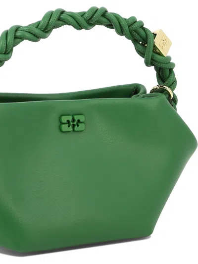 Shop Ganni "mini Bou" Handbag In 绿色的