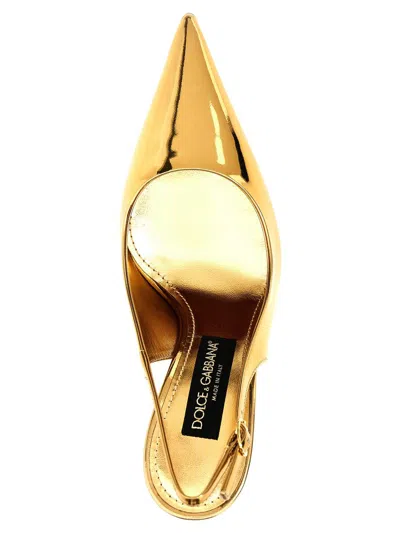 Shop Dolce & Gabbana Laminated Leather Slingback In Gold