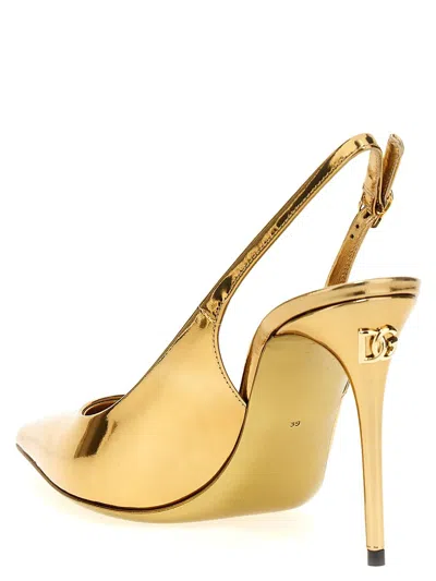 Shop Dolce & Gabbana Laminated Leather Slingback In Gold