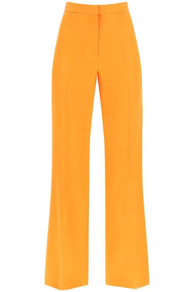 Shop Stella Mccartney Flared Tailoring Pants In Bright Orange (orange)