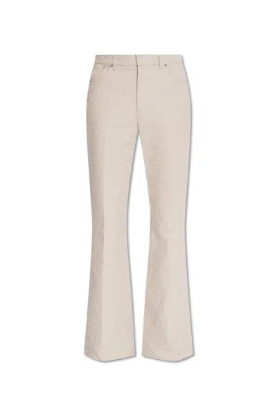 Shop Fendi Allover Monogrammed Flared Trousers In Default Title