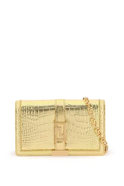 Shop Versace Croco-embossed Leather Greca Goddes Crossbody Bag In Gold  Gold (gold)