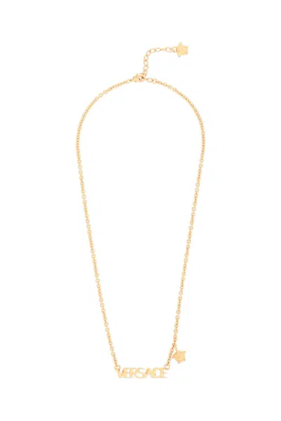 Shop Versace Lettering Logo Necklace In  Gold (gold)