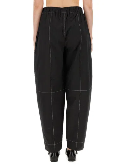Shop Ganni Stretch Pants In Black