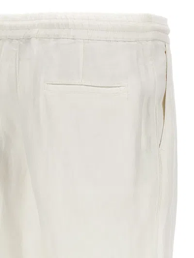 Shop Brunello Cucinelli Linen Pin Tuck Trousers In White