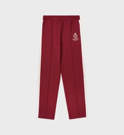 Shop Sporty And Rich Crown Track Pants In Merlot