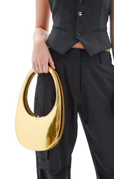 Shop Coperni Metallic Swipe Bag In Gold