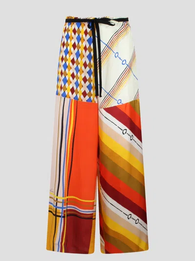 Shop Gucci Heritage Patchwork Print Silk Trousers In Multicolour