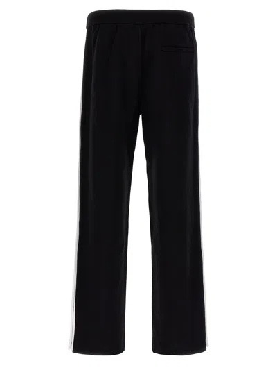 Shop Dsquared2 Pants In White/black