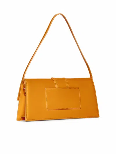 Shop Jacquemus Le Bambino Long Shoulder Bag In Orange