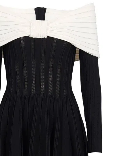 Shop Balmain Mini Black Dress With Off-the-shoulder Bow Neckline In Textured Knit Woman In White/black