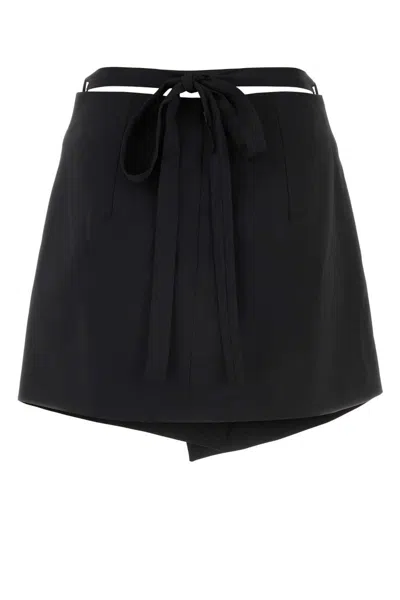 Patou Stretch Wool Mini Skirt With High Waist And A-line Silhouette In Black
