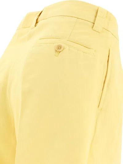 Shop Aspesi Pleated Shorts In Yellow