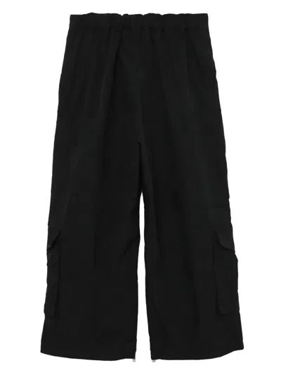 Shop Junya Watanabe Men Baggy Pants In Black