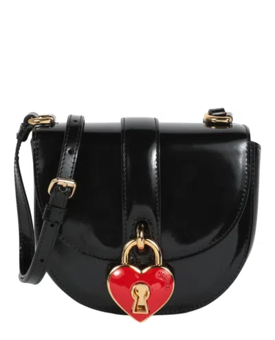 Shop Moschino Heart Lock Patent Leather Shoulder Bag In Black