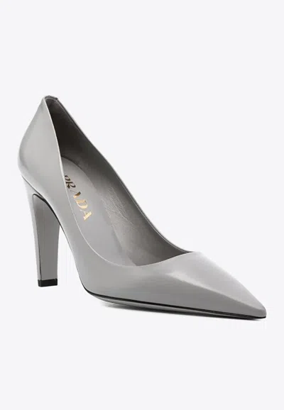 Shop Prada 100 Leather Pointed Pumps In Gray