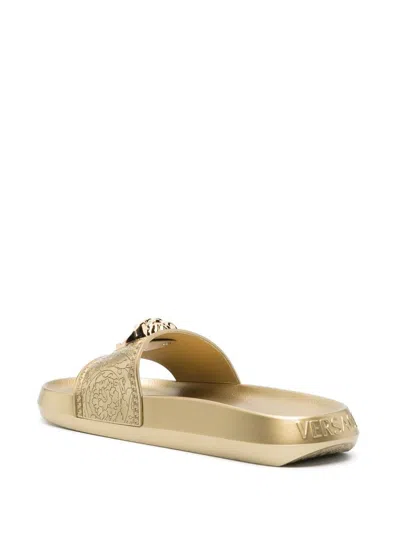Shop Versace Other In Gold