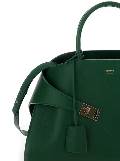 Shop Ferragamo 'hug M' Green Handbag With Logo And Gancini Buckle In Leather Woman