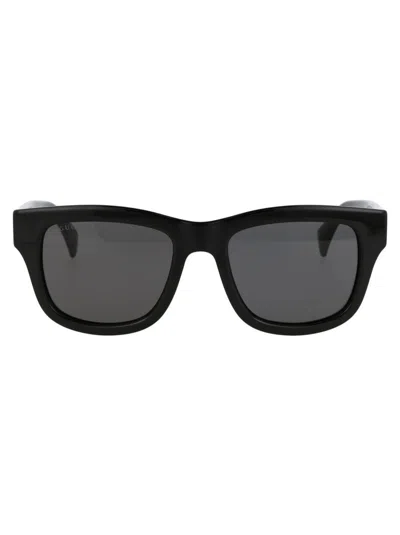 Shop Gucci Sunglasses In 002 Black Black Grey