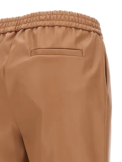 Shop Nude Eco Leather Pants In Beige