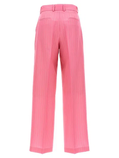 Shop Msgm Pinstripe Pants In Pink