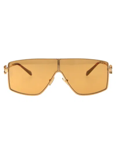 Shop Miu Miu Sunglasses In 5ak40d Gold