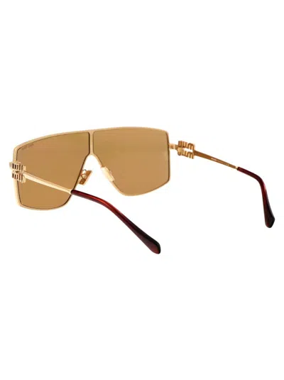 Shop Miu Miu Sunglasses In 5ak40d Gold