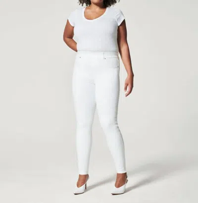 Shop Spanx Petite Skinny Jeans In White