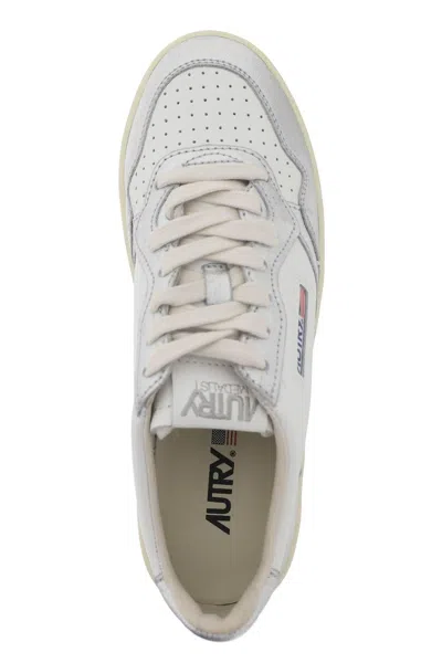 Shop Autry Medalist Low Sneakers In Silver,white