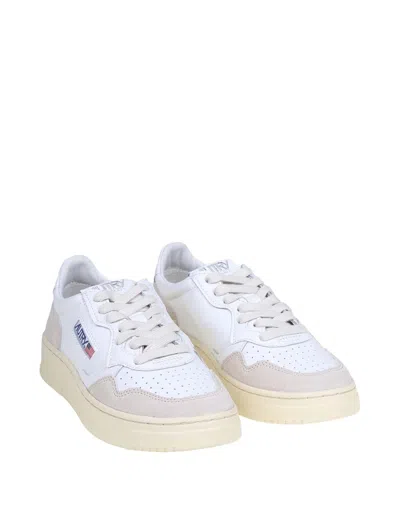 Shop Autry Leather And Suede Sneakers In White