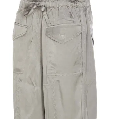 Shop Ganni Trousers In Grey