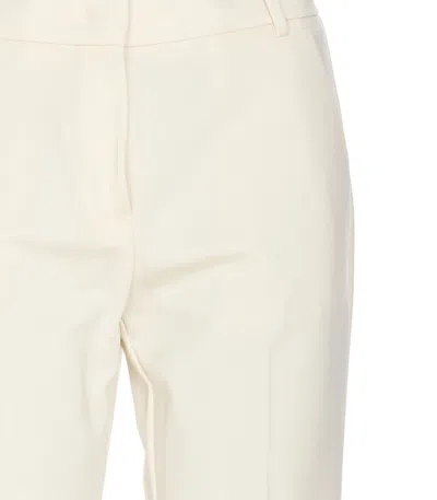 Shop Pinko Trousers In White