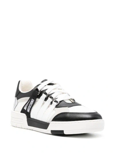 Shop Moschino Couture Sneakers In White