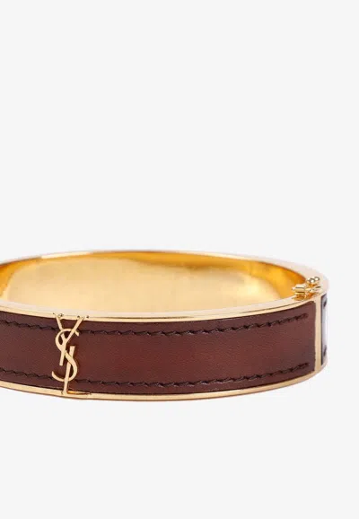 Shop Saint Laurent Cassandre Logo Leather Rigid Bracelet In Brown