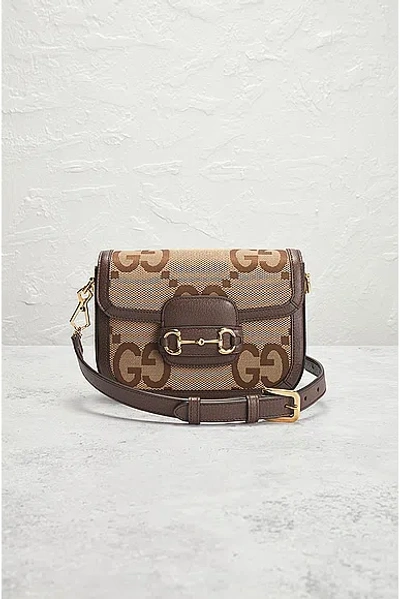 Shop Gucci Gg Horsebit Shoulder Bag In Brown