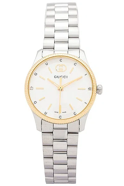 Shop Gucci G-timeless Slim Watch In Gold & Silver