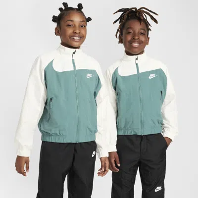 Shop Nike Sportswear Amplify Big Kids' Woven Full-zip Jacket In Green
