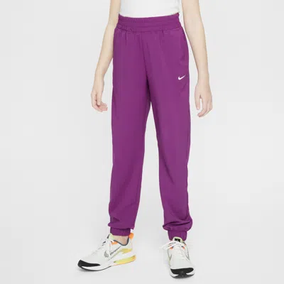 Shop Nike Dri-fit One Big Kids' (girls') Woven Training Pants In Purple