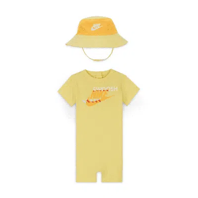 Shop Nike Sportswear Pe Baby (0-9m) Romper And Bucket Hat Set In Yellow