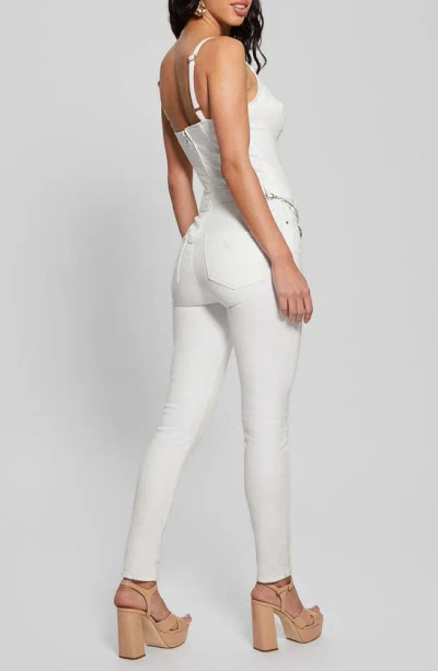 Shop Guess Vanna Sleeveless Denim Jumpsuit In White