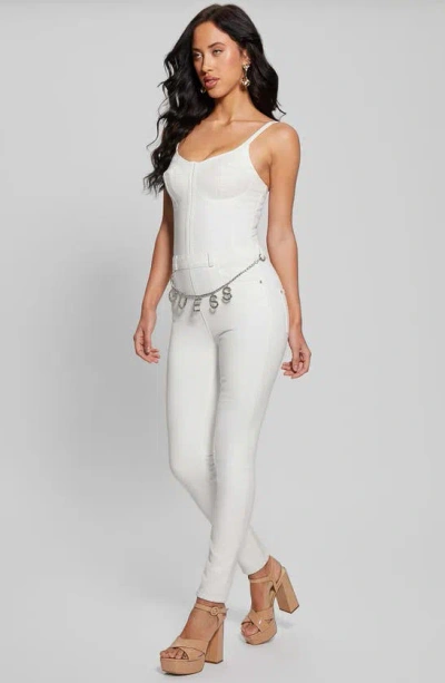 Shop Guess Vanna Sleeveless Denim Jumpsuit In White