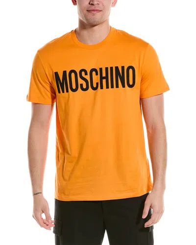 Shop Moschino T-shirt In Orange
