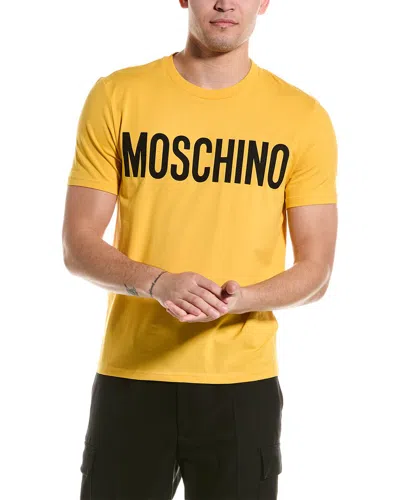 Shop Moschino T-shirt In Yellow