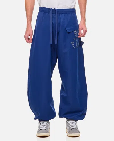Shop Jw Anderson J.w. Anderson Twisted Joggers In Blue