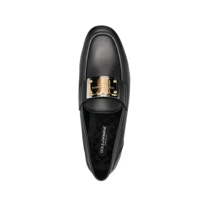 Shop Dolce & Gabbana Leather Logo Loafers In 黑色的