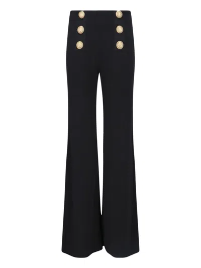 Shop Balmain Knit Flare Pants With Six Jewel Buttons In Black