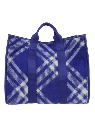 Shop Burberry Canvas Check Tote In Blue