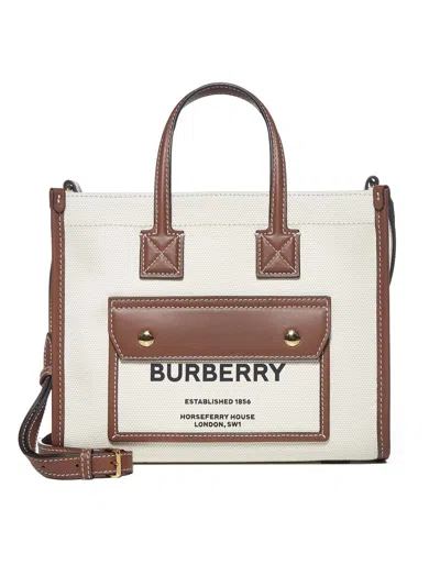 Shop Burberry New Tote Bag In Natural/tan